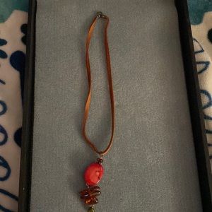 8 inch brown leather with red beads